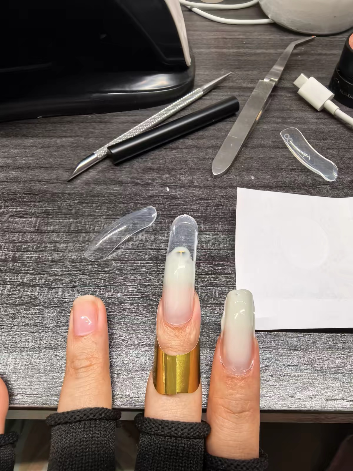 Customer photo for TAYE Anti-Overflow Dual-Layer Flight Nail Forms (150pcs)